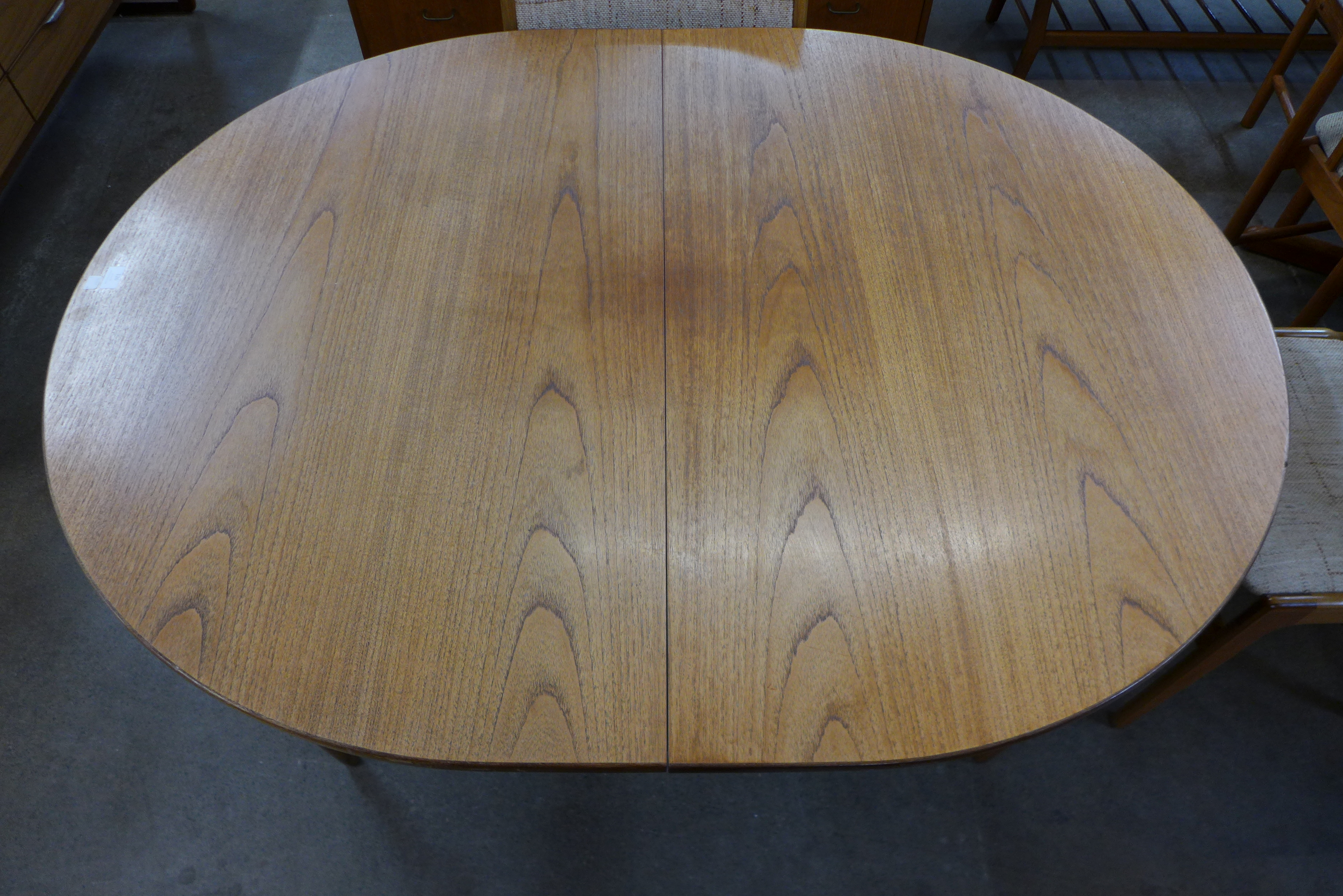 A teak extending dining table and six Eric Buch dining chairs - Image 4 of 4