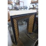 A Victorian cast iron fire insert