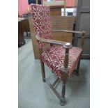 An Arts and Crafts George Walton style oak open armchair