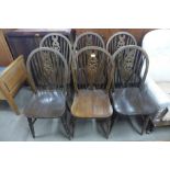 A set of six beech wheelback chairs