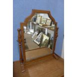 An oak dressing table mirror