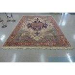 A large cream and salmon ground rug, 378 x 274cms