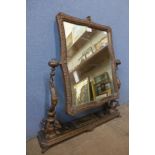 A 19th Century French copper dressing table mirror, 79cms h