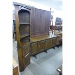 An oak dresser and an oak freestanding corner cabinet