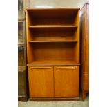 A teak open bookcase