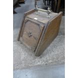 An Edward VII oak and brass coal scuttle