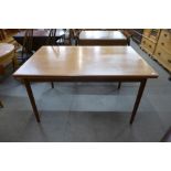 A Danish A.M. Mobelfabrik teak extending dining table