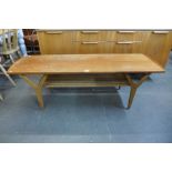 A Danish Henning Kjaernulf teak Y-leg coffee table