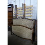 A French beech and upholstered double bed