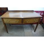 An Edward VII mahogany bow front two drawer side table, 82cms h, 122cms w, 57cms d