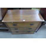 An Edward VII beech chest of drawers
