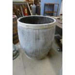 A galvanised dolly tub