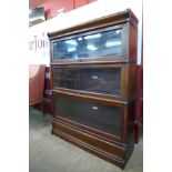 An early 20th Century Globe Wernicke oak three tier sectional stacking bookcase, 115cms h 87cms w,