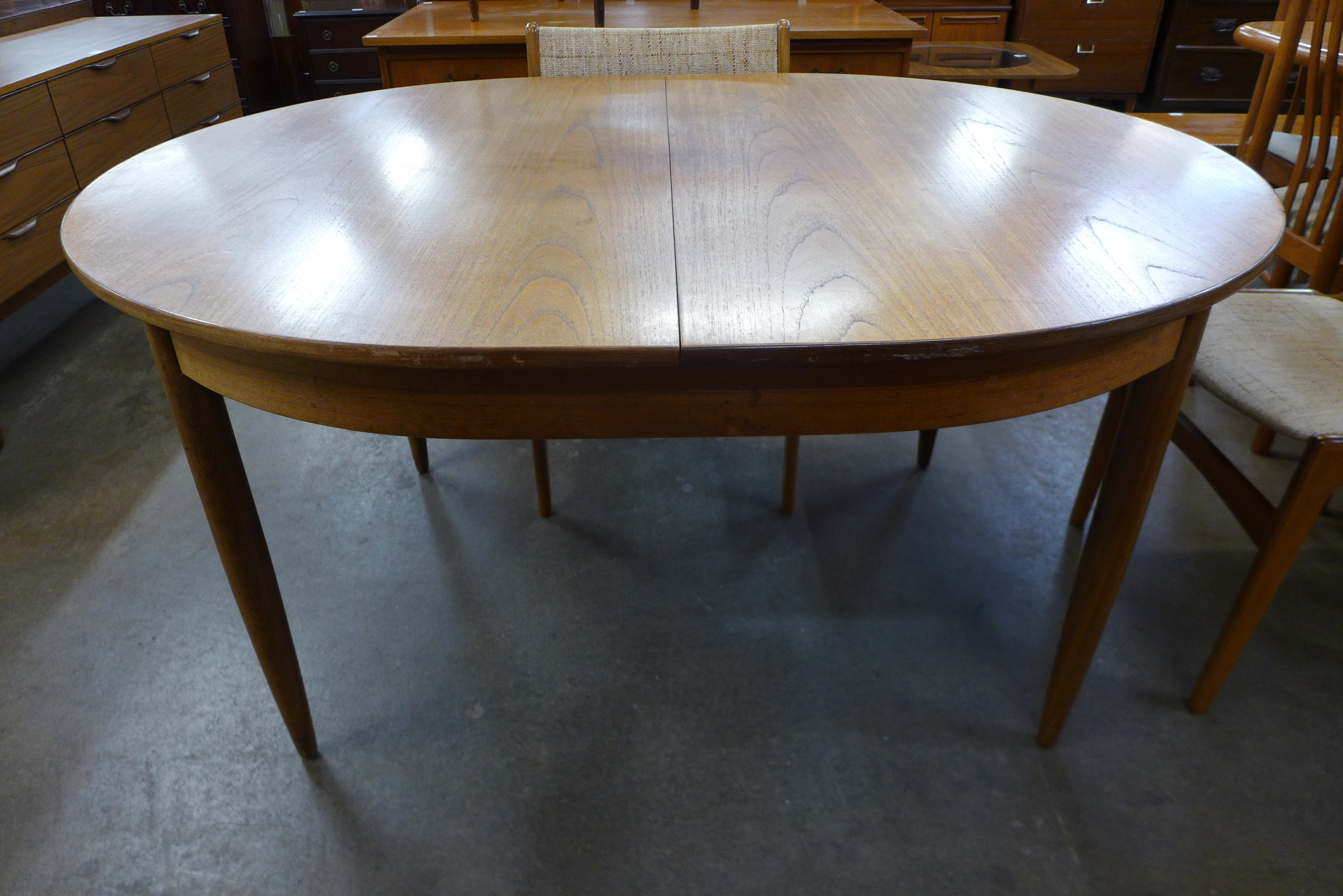 A teak extending dining table and six Eric Buch dining chairs - Image 3 of 4