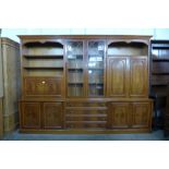 A large yew wood bookcase, 210cms h, 290cms w, 48cms d
