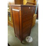 A hardwood chest of drawers