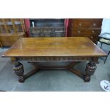 An Elizabethan Revival carved oak refectory table, 76cms h, 183cms l, 91cms w