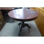 A Victorian mahogany centre table and another occasional table