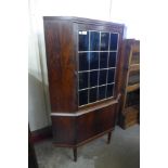 A Danish rosewood freestanding corner cabinet, 139cms h, 85cms w, 54cms d *Accompanied by CITES