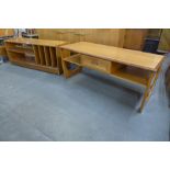 A teak record cabinet and a teak single drawer coffee table