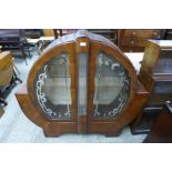 An Art Deco mahogany circular display cabinet