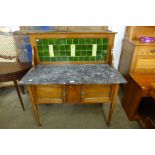 An Edward VII inlaid mahogany and marble topped washstand