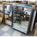 A gilt framed mirror and another mirror