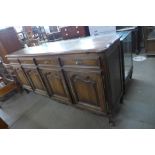 A French Breton oak dresser, 102cms h, 220cms w, 53cms d