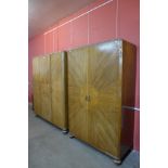 A pair of Art Deco walnut, burr walnut and parcel gilt fitted wardrobes, 194cms h, 169cms w, 56cms d
