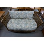 An Ercol Golden Dawn elm settee