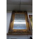 A large gilt framed mirror, 126 x 97cms