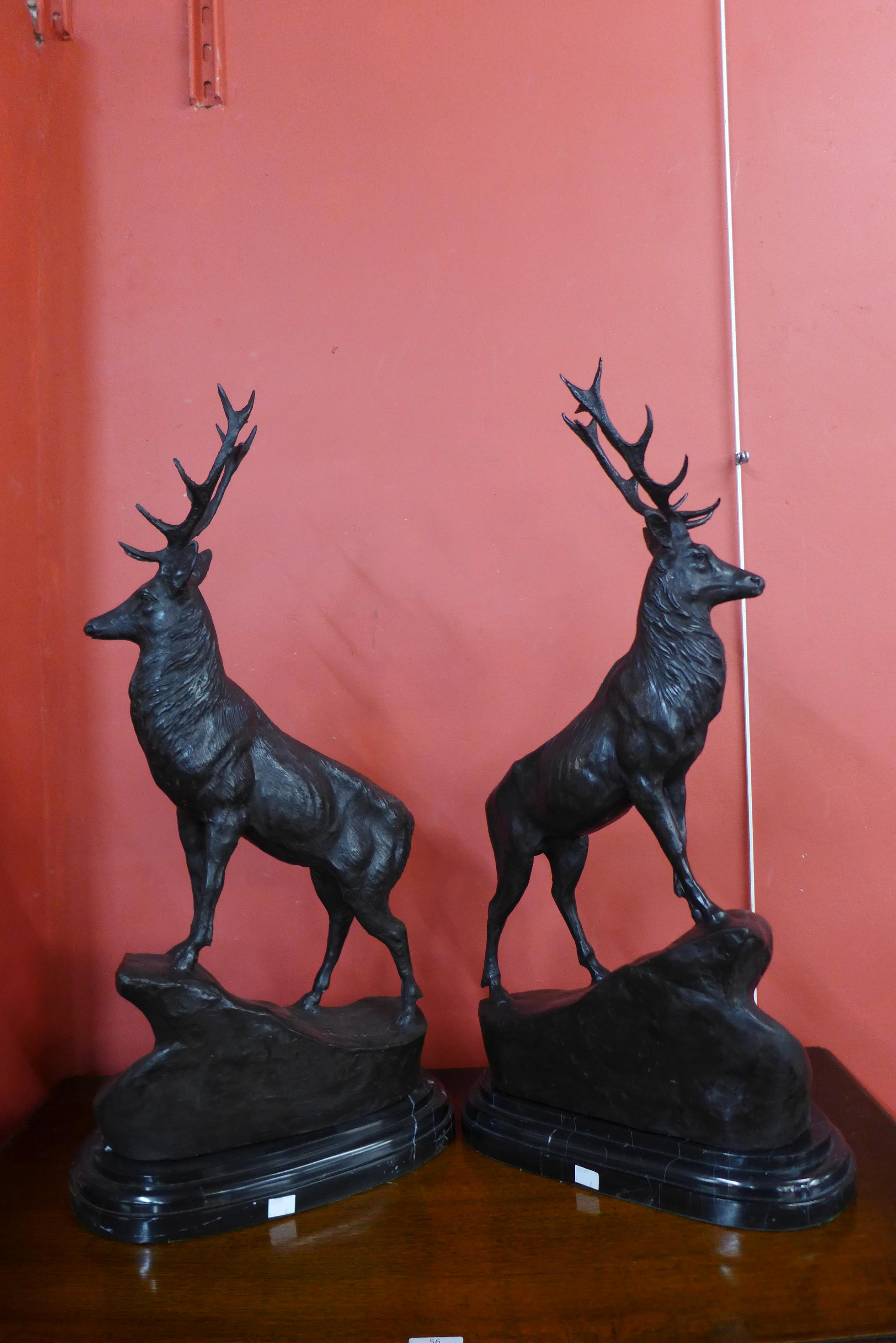 A pair of French style bronze stags, on black marble plinths, 73cms h - Image 2 of 2