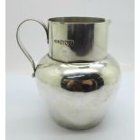 A silver jug, London 1910, 163g, 10cm