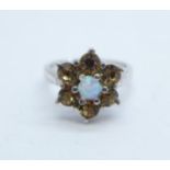 A cluster dress ring with synthetic opal and cognac coloured crystal, N