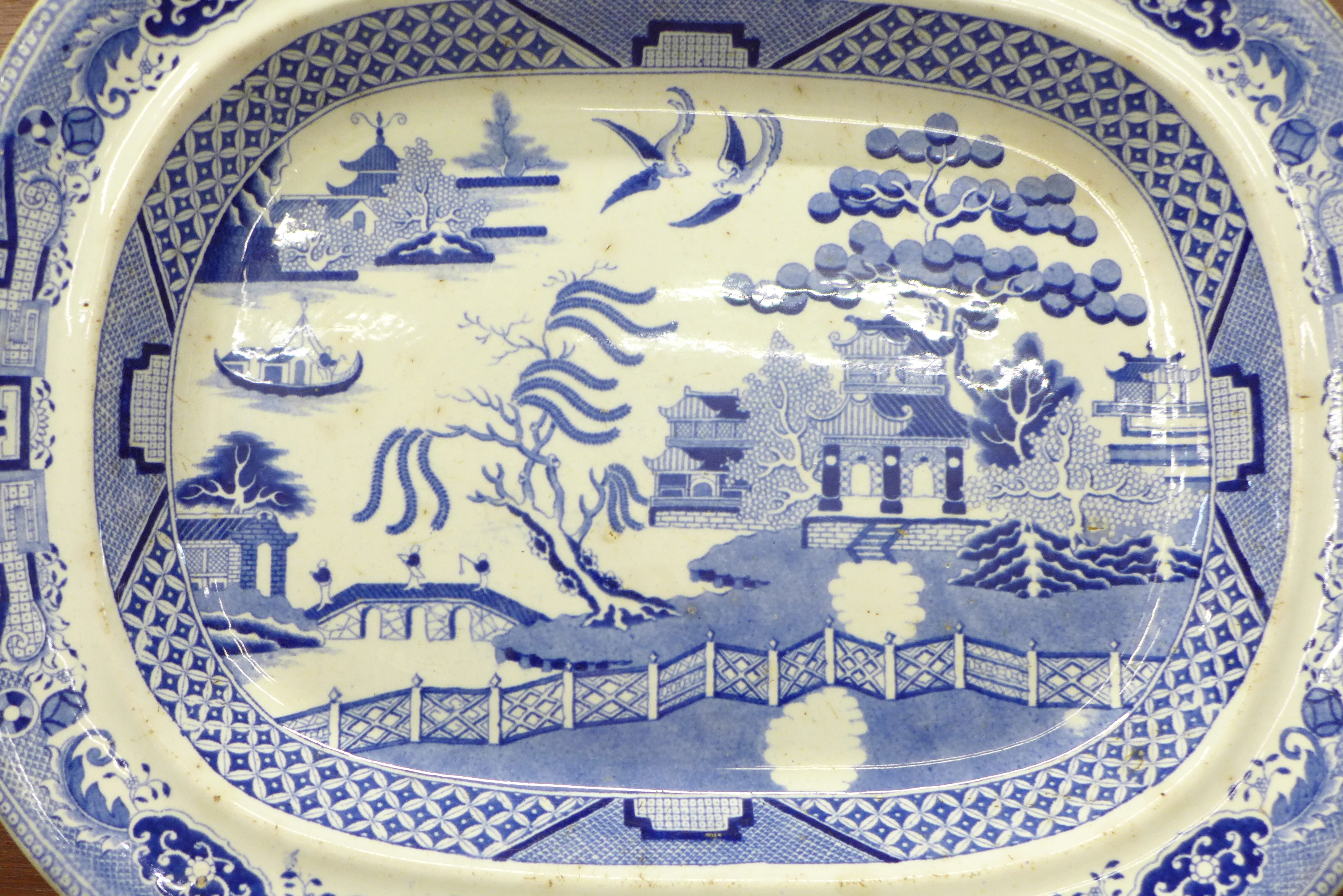 Two blue and white willow pattern meat plates, both a/f - Image 3 of 7