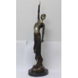 An Art Deco bronzed figure of a flapper girl, 49cm