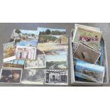 A small box of postcards, vintage to modern