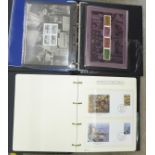 A collection of WWII commemorative first day covers and mint stamps