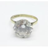 A large silver gilt solitaire ring, T
