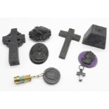 A jet Celtic cross, a crucifix pendant, two unmounted cameos, etc.