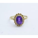 A 9ct gold and amethyst ring, 1.8g, R