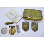 A Christmas tin, The Kings Medal 1911 to E.Evans, a Household Brigade Best Shot medallion, two