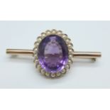 A yellow metal, amethyst and pearl brooch, 9.7g, (tests as 9ct gold), amethyst 15mm x 18mm