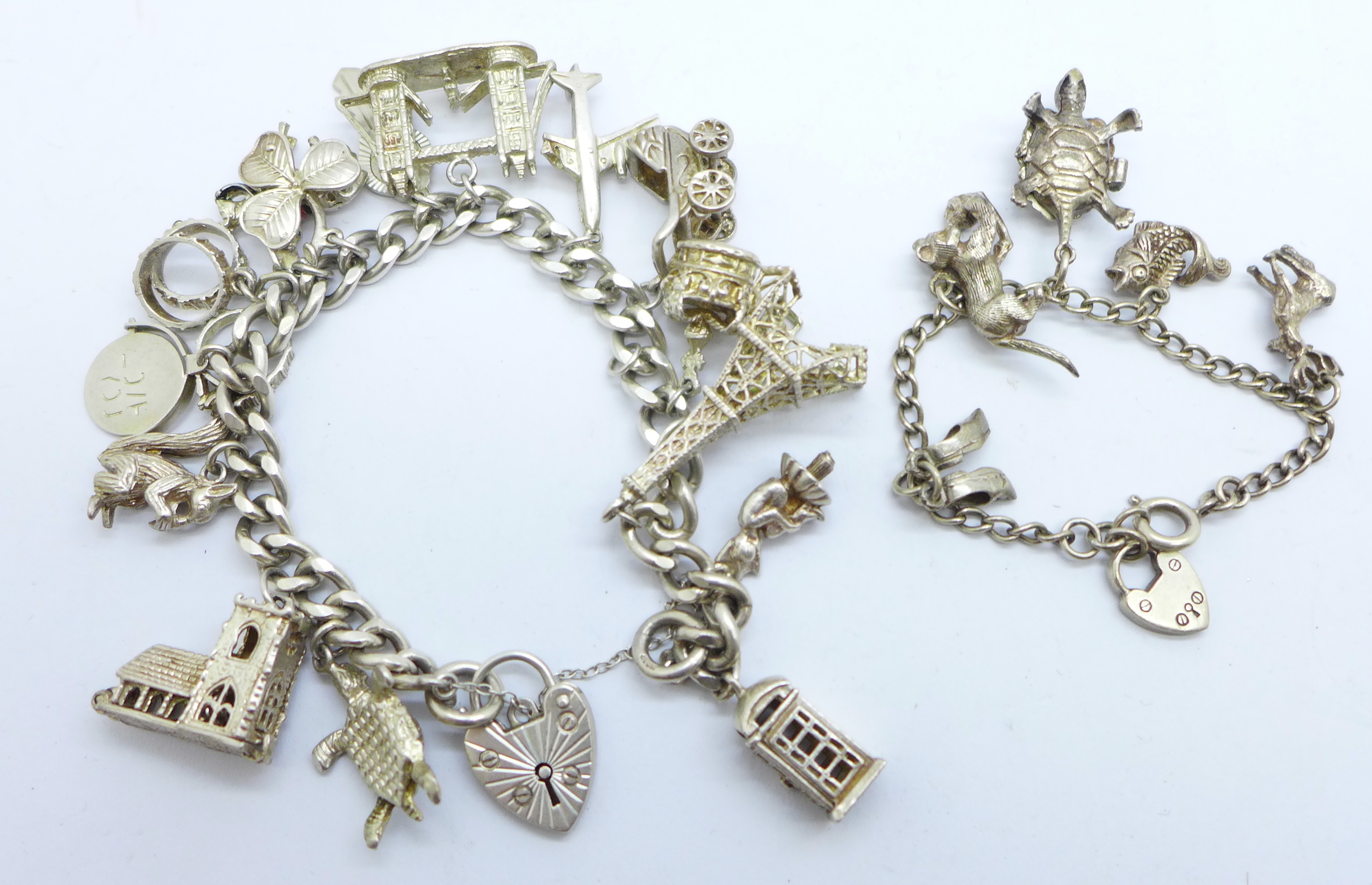 Two silver charm bracelets, 93g