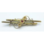 A 9ct gold, ruby and diamond brooch, 2.8g