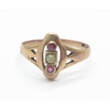 A .333 (8ct gold), pearl and garnet three stone ring, 1.8g, Q