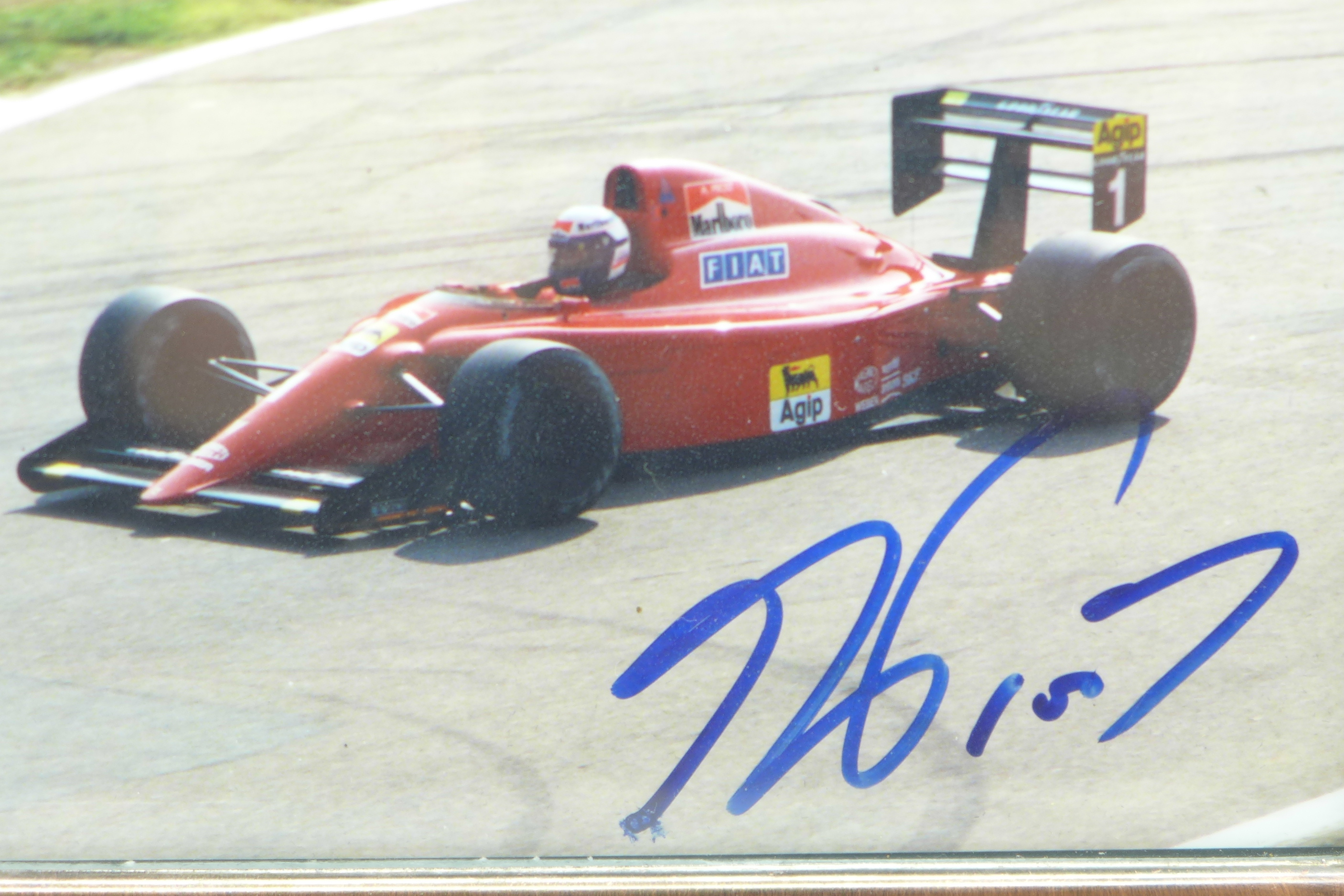 A framed photograph of a Ferrari F1 car, signed by Alain Prost - Image 2 of 2