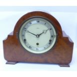 An Elliott mantel clock with chiming movement, the dial marked Cope, Nottingham