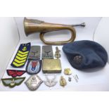 Military badges, a WWI trench art brass box, a RAF beret and a bugle with Argyle and Sutherland