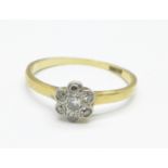 An 18ct gold and diamond cluster ring, 1.9g, K